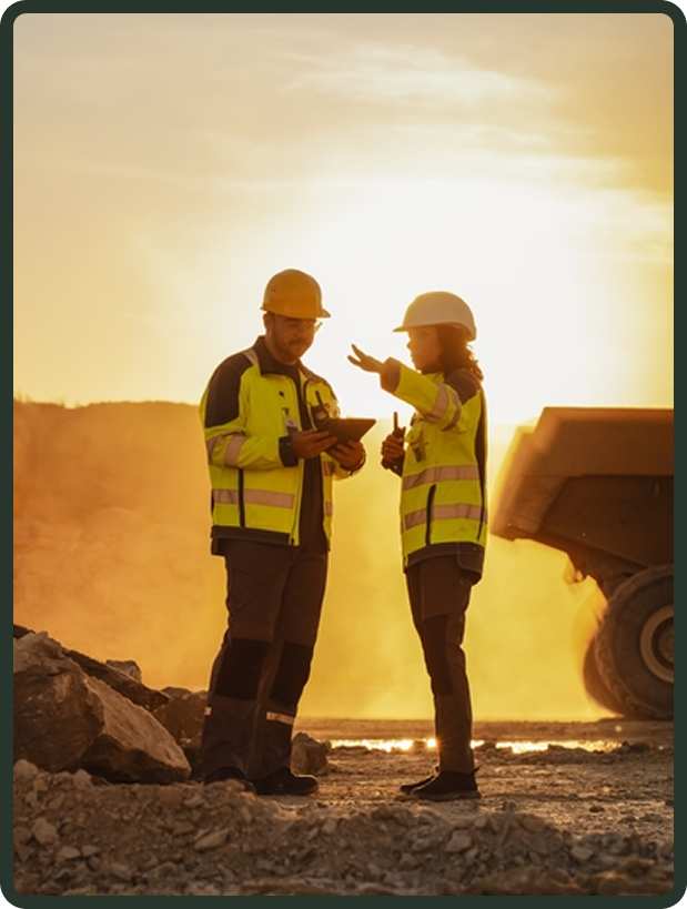 Engineers collaborating at a building site
